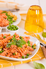 Fusilli pasta with peas and sweet corn.