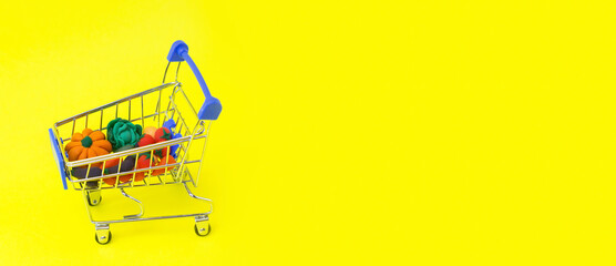 Metal shopping cart with grocery and products. Organic vegetables. Delivery concept. Horizontal banner with copy space.