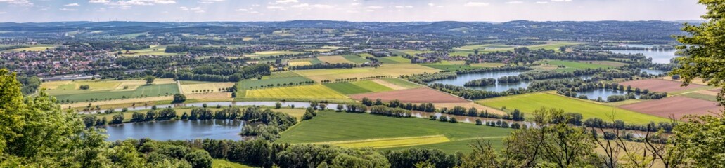 Fototapeta na wymiar Panorama Blick vom Wittekindsberg Richtung Porta Westfalica und Bad Oeynhausen im Sommer 2021