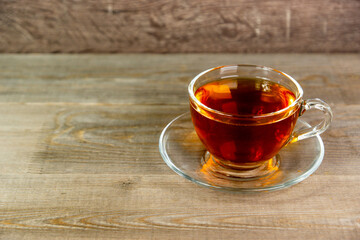 fresh tea in transparent glass cup