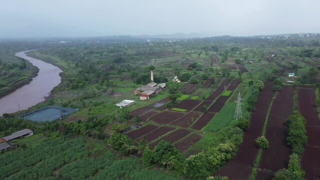 Aerial footage of rural monsoon landscape at Bhor near Pune India.