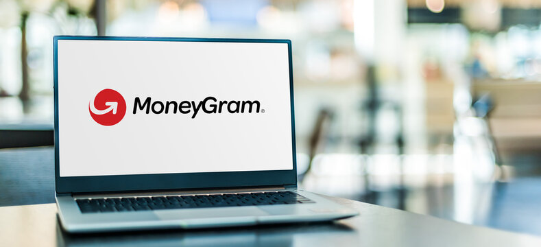 Laptop computer displaying logo of MoneyGram