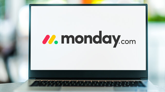 Laptop computer displaying logo of monday.com