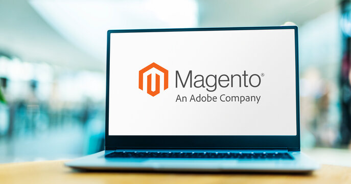 Laptop computer displaying logo of Magento