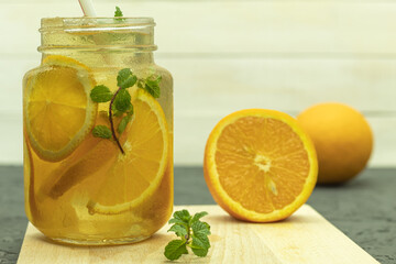 Cool lemonade made from orange and lime slices