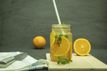 Cool lemonade made from orange and lime slices