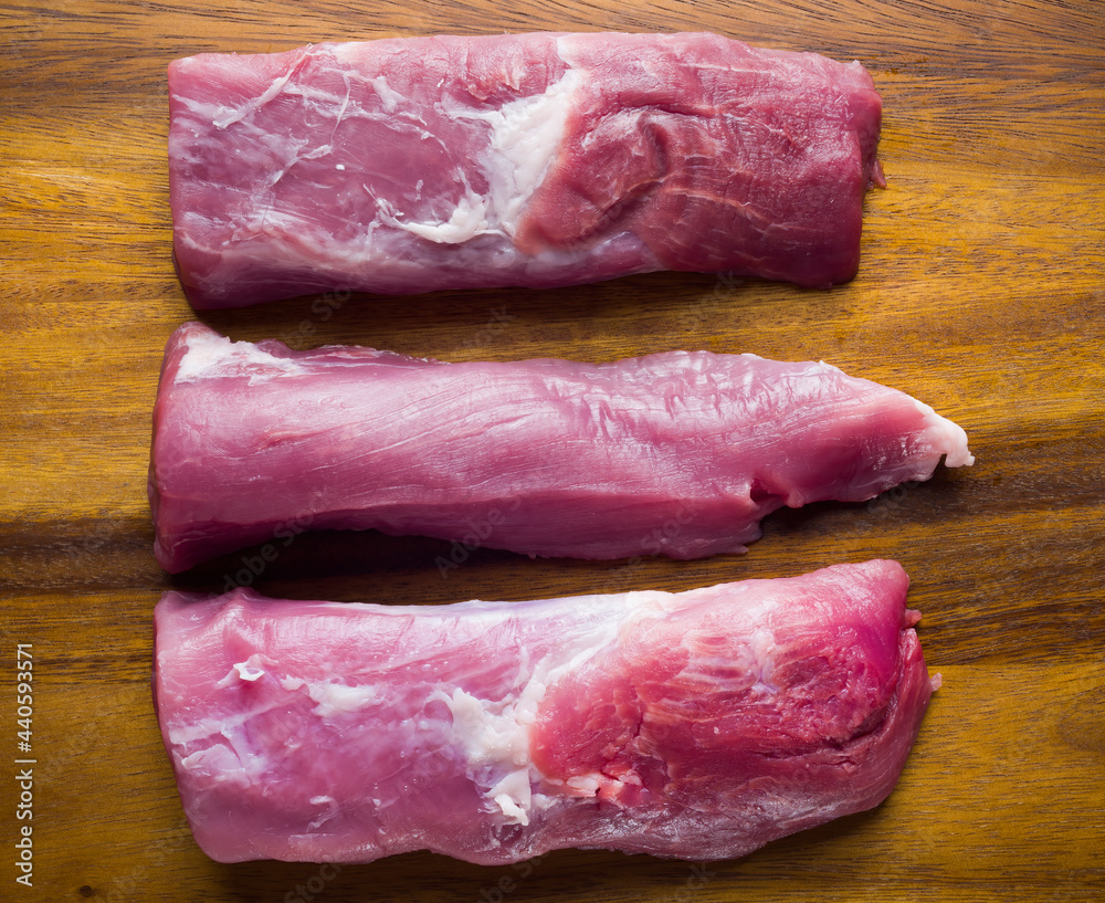 Sticker raw uncooked pork tenderloin