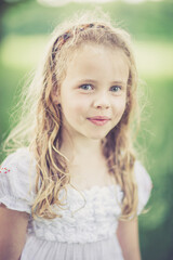 dreamy portrait of a young girl outdoor