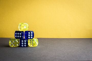 dice of red and blue yellow colors green and black background