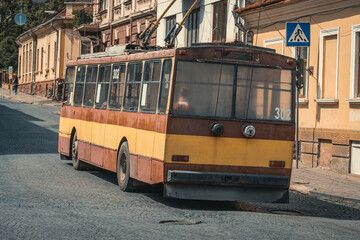 Old trolleybus carrying passengers in the city