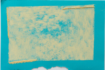 yellow chalk on blue paper background
