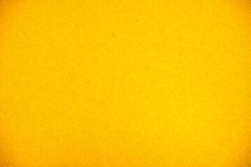 Yellow background. Antique. Suitable for backgrounds. The texture of the cardboard.
