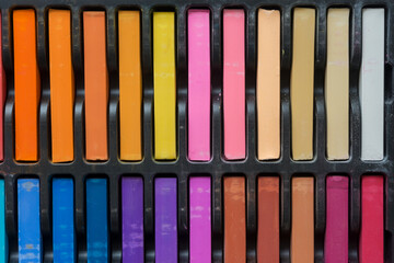 bold or vivid sticks of soft pastels in a set - photographed from above or top down