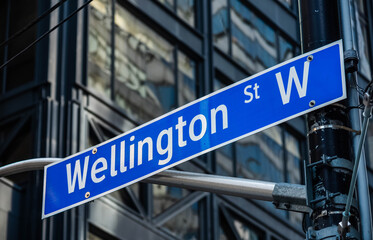 Fototapeta premium Wellington street west sign in downtown Toronto.