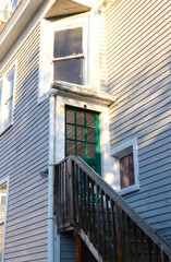 Architecture, Oddly Placed Windows, Green Door, Exterior Staircase,