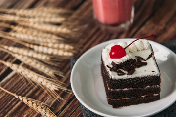 chocolate cake with cherries and Strawberry Smoothie