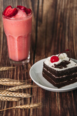 chocolate cake with cherries and Strawberry Smoothie