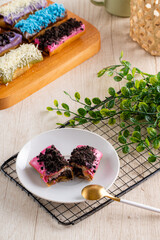 Piscok or banana chocolate is  traditional snacks from Indonesia. made of fried banana wrapped in spring roll skin and assorted melted 
toppings (Chocolate, Taro, Strawberry) 