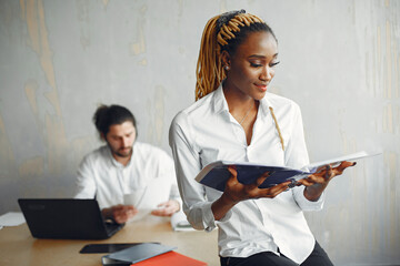 Mixed businesspeople working at the office