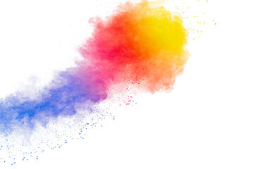 Abstract multi colored powder explosion on white background. Freeze motion of colorful dust ...