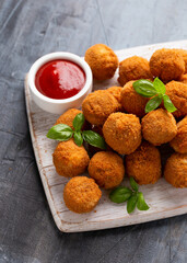 Meat free vegetarian mini picnic scotch eggs with micoprotein and herbs served with ketchup and mayonnaise