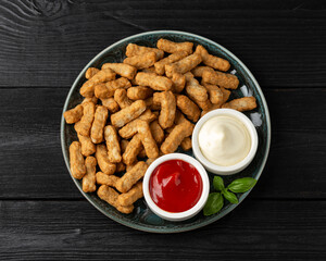 Party finger food southern style chicken breast bites served with ketchup and mayonnaise