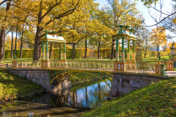 One of the oldest twin Chinese bridges in the Golden Autumn. Alexander Park of theTsarskoe Selo....