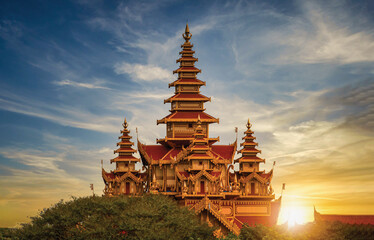 Landscape image of Ancient pagoda at sunset in Bagan, Myanmar.