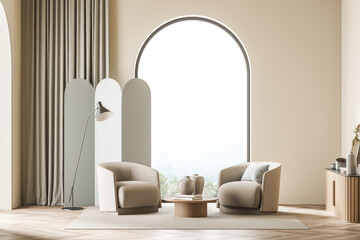 Light living room interior with two armchairs near arched window