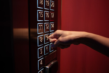 push lift finger closeup, elevator button © waranyu