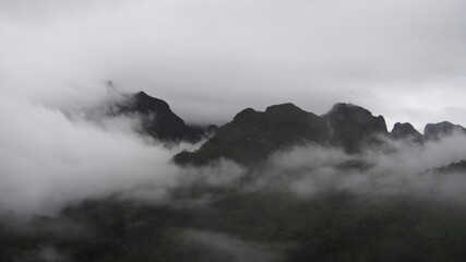 Beautiful view of high mountain with fog in the morning for natural view and inspirational concept 
