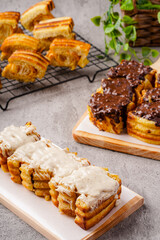 Roti Bakar Bandung or Bandung Bread Toast is Popular Street Food from Bandung. Roti bakar refers to toast, served often with butter, cheese, stwarberry jam, Green tea, crushed peanuts and sugar,