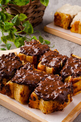 Roti Bakar Bandung or Bandung Bread Toast is Popular Street Food from Bandung. Roti bakar refers to toast, served often with butter, cheese, stwarberry jam, Green tea, crushed peanuts and sugar,