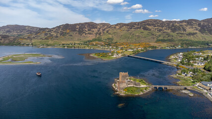 Fototapeta premium The ancient Eilean Donan Castle overlooking Loch Duich in the Scottish Highlands, UK