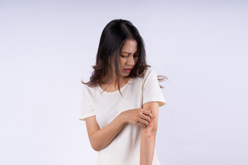 Fototapeta premium Portrait of Asian woman with itching isolated on white background