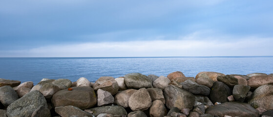 Fototapeta na wymiar big rocks by the sea