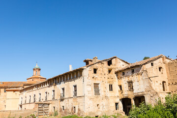 Fototapeta premium Casa Lucias (house of the Azcon-Sancho) and the church in Baguena, province of Teruel, Aragon, Spain