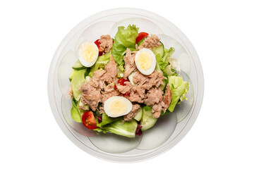 Fresh tuna salad with lettuce, cucombers, cherries and eggs in plastic container.