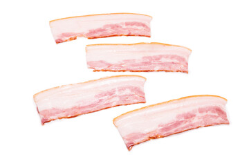 Obraz premium Raw bacon slices isolated on a white background.
