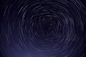 night sky with stars and satellites