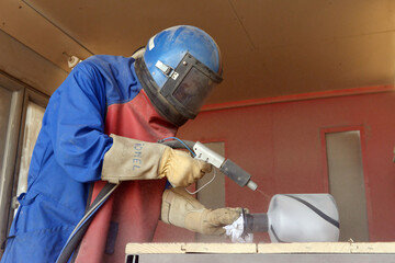 sablage d'un r&eacute;cipient en verre