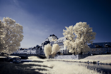 infrared photography - surreal ir photo of landscape with trees under cloudy sky - the art of our...