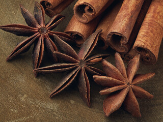 Cinnamon sticks and anise star isolated on white background close up