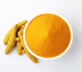Indian spices, Turmeric powder or haldi powder Turmeric with roots 
