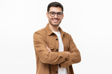 Young hispanic man wearing brown shirt and glasses, looking at camera with positive confident...