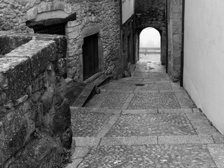Typical street in the historic town of Miranda del Castaar. Spain.