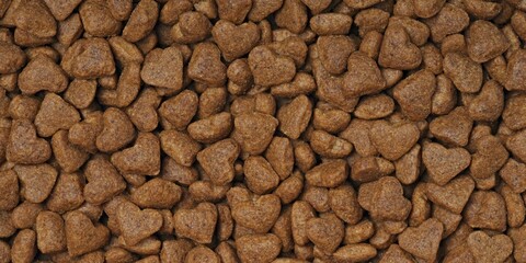 Heart shaped dryed food for cats and dogs. Panoramic background texture.	