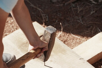 hammering a nail