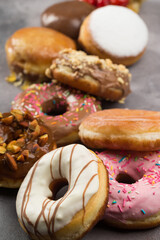 Various doughnuts in composition at studio shot