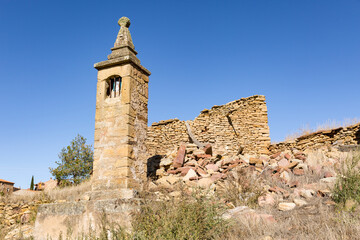 Fototapeta na wymiar Virgin of the Pilar Peiron/humilladero (tiny Christian chapel on top of a column) in Hombrados village, province of Guadalajara, Castile La Mancha, Spain